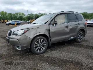 2017 Subaru Forester Touring with VIN JF2SJGWC5HH800095, listed as a Copart auction lot 56102735 with 95,325 mi miles and Salvage title. Bid and sale history available at DreamBid. Image 1.