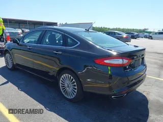 2016 Ford Fusion Titanium with VIN 3FA6P0K9XGR158234, listed as a IAAI auction lot 42043716 with 161,164 mi miles. Bid and sale history available at carsss.com. Image 3.