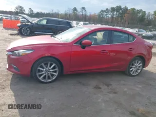 2017 Mazda 3 Touring with VIN 3MZBN1V76HM129257, listed as a IAAI auction lot 41908061 with 116,727 mi miles and . Bid and sale history available at DreamBid. Image 14.