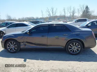 2014 Chrysler 300 with VIN 2C3CCAGG2EH384383, listed as a IAAI auction lot 42044047 with 114,271 mi miles. Bid and sale history available at carsss.com. Image 14.