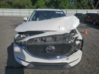 2017 Mazda CX-5 Grand Touring with VIN JM3KFADL1H0141132, listed as a Copart auction lot 51755095 with 116,220 mi miles and Salvage Title. Bid and sale history available at carsss.com. Image 5.