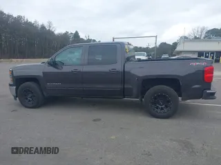 2015 Chevrolet Silverado 1500 LT with VIN 3GCUKREC9FG519510, listed as a IAAI auction lot 42026865 with 119,510 mi miles and . Bid and sale history available at DreamBid. Image 14.