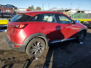 2018 Mazda CX-3 Grand Touring z VIN JM1DKFD75J0319224, wystawiony jako Copart lot #87504495 z przebiegiem 47 466 mil mil oraz Szkody całkowita. Historia ofert i sprzedaży dostępna na DreamBid. Obrazek 3.