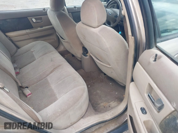 2003 Ford Taurus SE Standard with VIN 1FAFP53U63G125751, listed as a IAAI auction lot 41933803 with 196,710 mi miles. Bid and sale history available at carsss.com. Image 8.