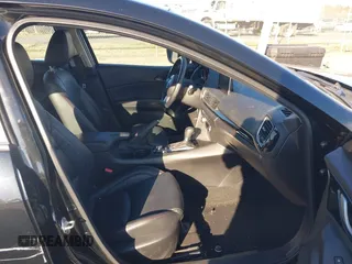 2014 Mazda 3 i Grand Touring with VIN JM1BM1M70E1211906, listed as a IAAI auction lot 41878585 with 112,013 mi miles and . Bid and sale history available at DreamBid. Image 5.