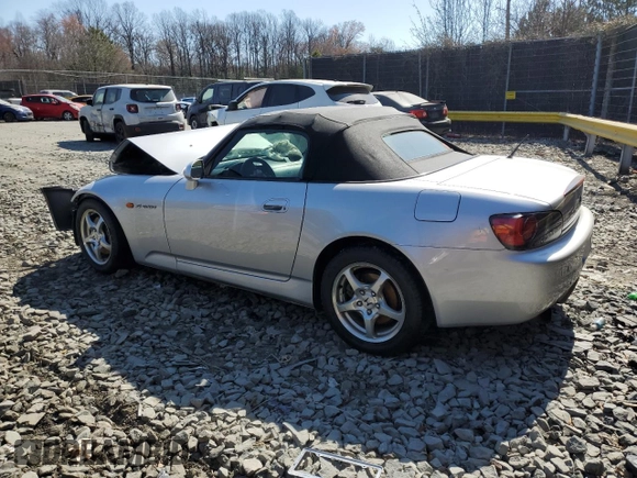 2002 Honda S2000 with VIN JHMAP11412T003822, listed as a Copart auction lot 48801985 with 122,850 mi miles and Salvage Title. Bid and sale history available at DreamBid. Image 2.