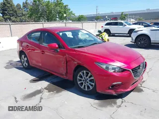 2014 Mazda 3 i Touring with VIN JM1BM1V75E1112948, listed as a IAAI auction lot 42184319 with 59,855 mi miles and . Bid and sale history available at DreamBid. Image 1.