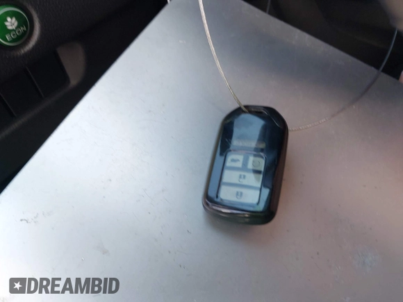2020 Honda Pilot EX-L with VIN 5FNYF5H59LB028268, listed as a IAAI auction lot 42355620 with 107,033 mi miles and . Bid and sale history available at DreamBid. Image 11.