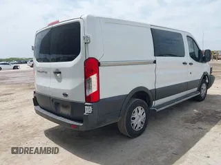 2018 Ford Transit with VIN 1FTYR1YM1JKA98581, listed as a IAAI auction lot 41941407 with 98,543 mi miles and . Bid and sale history available at carsss.com. Image 4.