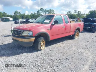 2001 Ford F-150 XL with VIN 1FTRX18W21NA89561, listed as a IAAI auction lot 42505859 with Not provided miles and . Bid and sale history available at DreamBid. Image 2.