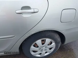 2002 Toyota Camry LE z VIN JTDBE32K220022434, wystawiony jako IAAI lot #42194752 z przebiegiem 168 955 mil mil oraz . Historia ofert i sprzedaży dostępna na DreamBid. Obrazek 6.