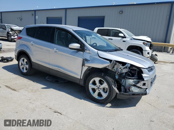 2015 Ford Escape SE with VIN 1FMCU0GX5FUC43739, listed as a Copart auction lot 71996704 with 56,561 mi miles and Salvage Title. Bid and sale history available at carsss.com. Image 4.