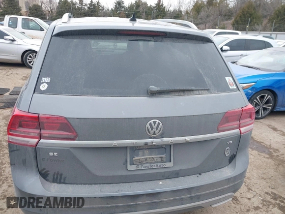 2019 Volkswagen Atlas SE with VIN 1V2WR2CA2KC581212, listed as a IAAI auction lot 41631619 with 122,160 mi miles and . Bid and sale history available at DreamBid. Image 17.