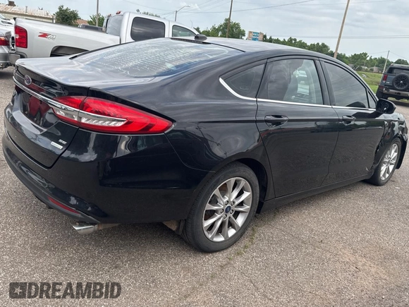 2017 Ford Fusion SE z VIN 3FA6P0HD3HR335333, wystawiony jako Copart lot #58443285 z przebiegiem 158 326 mil mil oraz Czysty tytuł • Clean title. Historia ofert i sprzedaży dostępna na DreamBid. Obrazek 4.