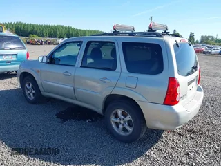 2005 Mazda Tribute S with VIN 4F2CZ96105KM04032, listed as a IAAI auction lot 42157429 with 199,704 mi miles and . Bid and sale history available at carsss.com. Image 3.