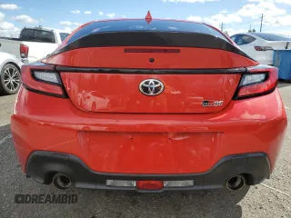 2024 Toyota 86 with VIN JF1ZNBB1XR9754144, listed as a Copart auction lot 48593365 with 5,057 mi miles and Salvage Title. Bid and sale history available at DreamBid. Image 6.