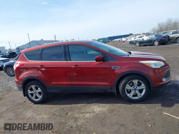 2014 Ford Escape SE with VIN 1FMCU9GX3EUA81161, listed as a IAAI auction lot 41968609 with 112,931 mi miles and . Bid and sale history available at DreamBid. Image 13.