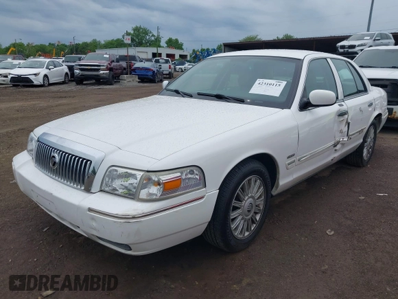 2010 Mercury Grand Marquis LS z VIN 2MEBM7FV0AX631065, wystawiony jako IAAI lot #42310115 z przebiegiem 67 110 mil mil oraz . Historia ofert i sprzedaży dostępna na DreamBid. Obrazek 2.