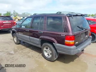 1997 Jeep Grand Cherokee Laredo with VIN 1J4GZ58S4VC702040, listed as a IAAI auction lot 42165536 with 121,803 mi miles and . Bid and sale history available at DreamBid. Image 3.