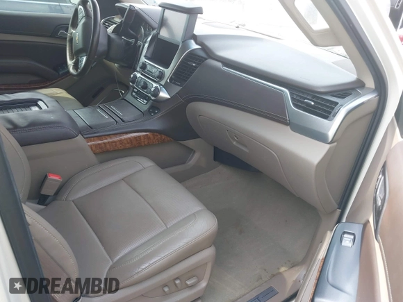 2015 Chevrolet Suburban LTZ with VIN 1GNSCKKC5FR740352, listed as a IAAI auction lot 39075234 with 112,945 mi miles and . Bid and sale history available at DreamBid. Image 5.
