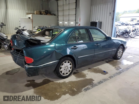 1998 Mercedes-Benz E-Class with VIN WDBJF65F6WA590094, listed as a Copart auction lot 72751984 with 196,048 mi miles and Salvage Title. Bid and sale history available at carsss.com. Image 3.