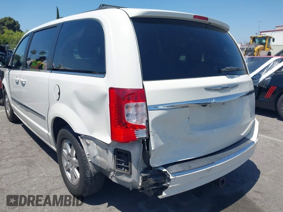 2012 Chrysler Town & Country Touring with VIN 2C4RC1BG5CR291815, listed as a IAAI auction lot 42147129 with 167,982 mi miles and . Bid and sale history available at DreamBid. Image 6.