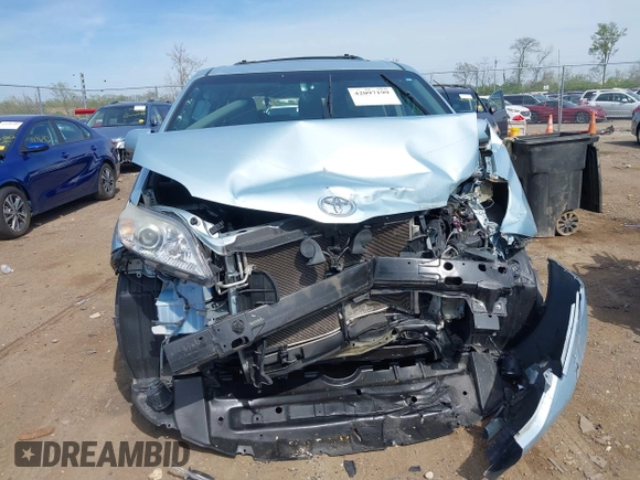 2015 Toyota Sienna XLE with VIN 5TDYK3DC3FS609947, listed as a IAAI auction lot 42097199 with Not provided miles and . Bid and sale history available at DreamBid. Image 13.