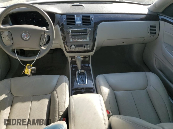 2010 Cadillac DTS w/1SC with VIN 1G6KD5EYXAU126775, listed as a Copart auction lot 77207094 with 100,288 mi miles and Salvage Title. Bid and sale history available at carsss.com. Image 8.