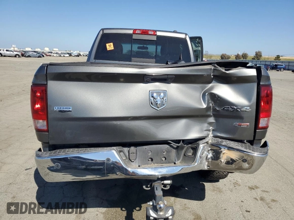 2012 Ram 2500 Laramie z VIN 3C6UD5FL3CG316312, wystawiony jako Copart lot #53863105 z przebiegiem 226 519 mil mil oraz Szkoda całkowita • Salvage title. Historia ofert i sprzedaży dostępna na DreamBid. Obrazek 6.