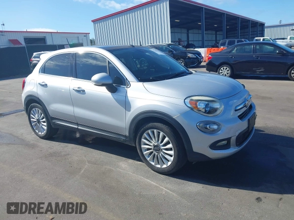 2016 FIAT 500X Lounge z VIN ZFBCFXDT2GP363767, wystawiony jako IAAI lot #37885612 z przebiegiem 74 859 mil mil oraz . Historia ofert i sprzedaży dostępna na DreamBid. Obrazek 1.