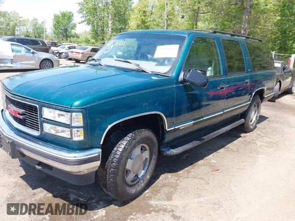 1997 GMC Suburban with VIN 3GKFK16R5VG508908, listed as a IAAI auction lot 42103068 with 264,446 mi miles and . Bid and sale history available at DreamBid. Image 2.