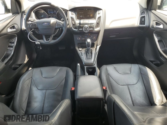 2015 Ford Focus Titanium с VIN 1FADP3J24FL304136, выставлен на аукционе Copart как лот 58428865 с пробегом 81 668 миль миль и Списание • Salvage title. История ставок и продаж доступна на DreamBid. Изображение 8.