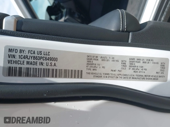 2023 Jeep Grand Cherokee with VIN 1C4RJYB63PC649000, listed as a IAAI auction lot 42306975 with 29,948 mi miles and . Bid and sale history available at DreamBid. Image 9.