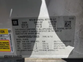 2013 Chevrolet Traverse LS with VIN 1GNKRFED2DJ130429, listed as a IAAI auction lot 41568017 with 213,210 mi miles. Bid and sale history available at carsss.com. Image 9.
