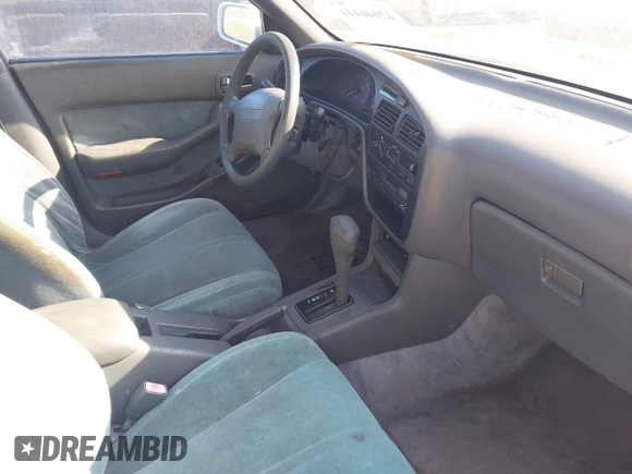 1993 Toyota Camry LE with VIN 4T1SK12E6PU316163, listed as a IAAI auction lot 42046444 with 261,514 mi miles. Bid and sale history available at carsss.com. Image 5.
