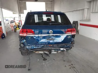 2019 Volkswagen Atlas SE with VIN 1V2LR2CAXKC605369, listed as a IAAI auction lot 39617117 with 74,432 mi miles and . Bid and sale history available at DreamBid. Image 17.