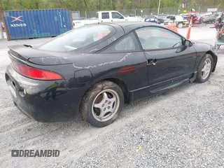 1997 Mitsubishi Eclipse with VIN 4A3AK44Y1VE042951, listed as a IAAI auction lot 42103920 with 119,268 mi miles and . Bid and sale history available at DreamBid. Image 4.