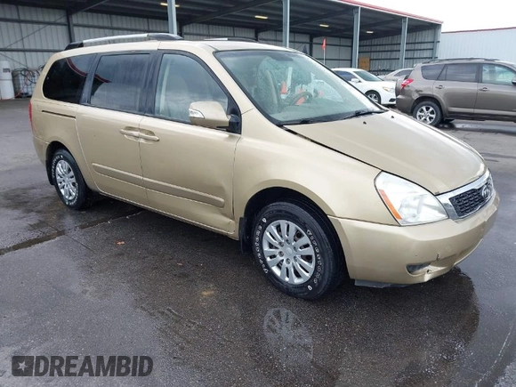 2011 Kia Sedona LX with VIN KNDMG4C71B6407306, listed as a IAAI auction lot 41922697 with 243,248 mi miles. Bid and sale history available at carsss.com. Image 1.