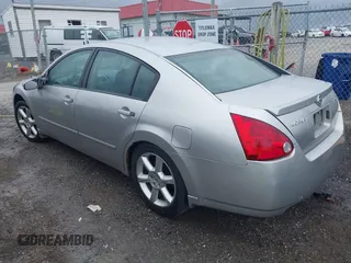 2004 Nissan Maxima SL with VIN 1N4BA41E14C802963, listed as a IAAI auction lot 41852156 with 112,855 mi miles. Bid and sale history available at carsss.com. Image 3.