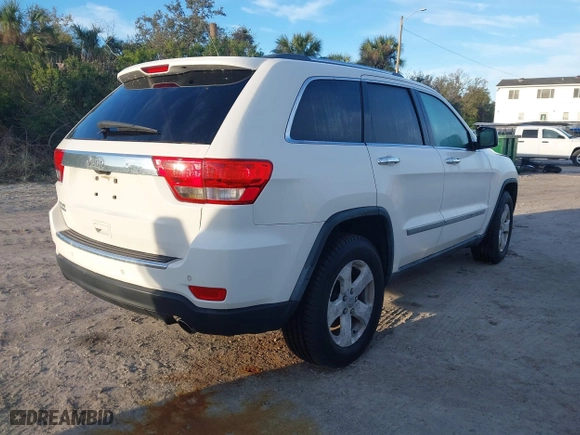 2011 Jeep Grand Cherokee Limited with VIN 1J4RR5GG0BC668910, listed as a IAAI auction lot 41353138 with 74,388 mi miles. Bid and sale history available at carsss.com. Image 4.