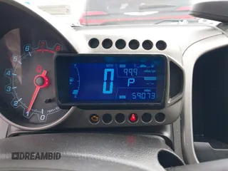 2015 Chevrolet Sonic LT with VIN 1G1JC5SH2F4105547, listed as a IAAI auction lot 42147287 with 59,073 mi miles and . Bid and sale history available at DreamBid. Image 7.