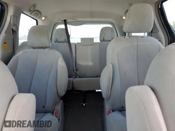 2014 Toyota Sienna L with VIN 5TDZK3DCXES463632, listed as a Copart auction lot 69957284 with 206,250 mi miles and Salvage Title. Bid and sale history available at carsss.com. Image 10.