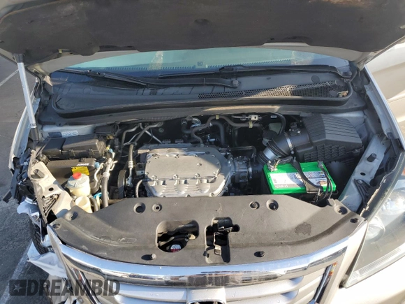 2009 Honda Odyssey EX-L with VIN 5FNRL38619B044063, listed as a Copart auction lot 52372505 with 204,658 mi miles and Salvage Title. Bid and sale history available at DreamBid. Image 12.