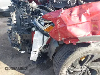 2023 Volkswagen Atlas SE z VIN 1V2JR2CA0PC538697, wystawiony jako IAAI lot #41347126 z przebiegiem 28 310 mil mil oraz . Historia ofert i sprzedaży dostępna na DreamBid. Obrazek 6.