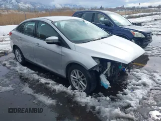 2016 Ford Focus SE with VIN 1FADP3F21GL325603, listed as a IAAI auction lot 41562523 with 97,749 mi miles. Bid and sale history available at carsss.com. Image 1.