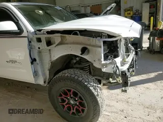 2021 Toyota Tacoma 4WD SR5 with VIN 3TMDZ5BN4MM103311, listed as a Copart auction lot 46486445 with 125,685 mi miles and Salvage Title. Bid and sale history available at carsss.com. Image 11.