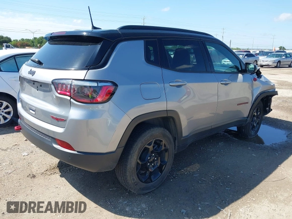2023 Jeep Compass Trailhawk with VIN 3C4NJDDN2PT567047, listed as a IAAI auction lot 42376543 with 41,924 mi miles and . Bid and sale history available at DreamBid. Image 4.