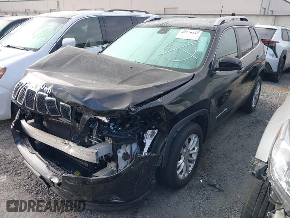 2019 Jeep Cherokee Latitude z VIN 1C4PJLCB2KD455843, wystawiony jako IAAI lot #42779247 z przebiegiem 65 576 mil mil oraz . Historia ofert i sprzedaży dostępna na DreamBid. Obrazek 2.