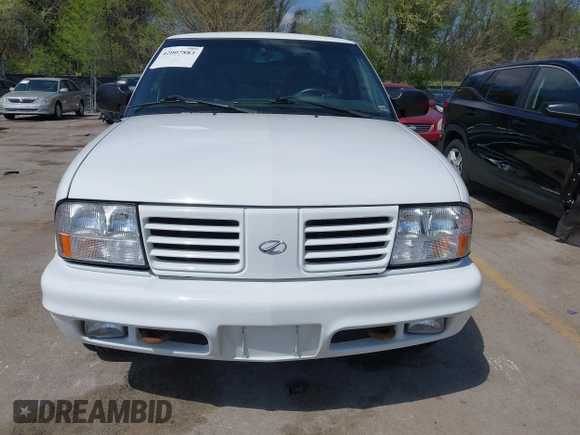 2001 Oldsmobile Bravada z VIN 1GHDT13W612113305, wystawiony jako IAAI lot #42007883 z przebiegiem 117 627 mil mil oraz . Historia ofert i sprzedaży dostępna na DreamBid. Obrazek 6.