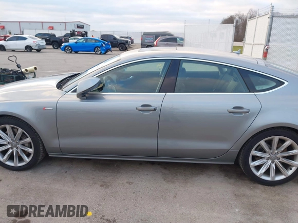 2014 Audi A7 Premium Plus z VIN WAUWGAFC9EN096702, wystawiony jako IAAI lot #41202201 z przebiegiem 103 893 mil mil oraz . Historia ofert i sprzedaży dostępna na DreamBid. Obrazek 14.